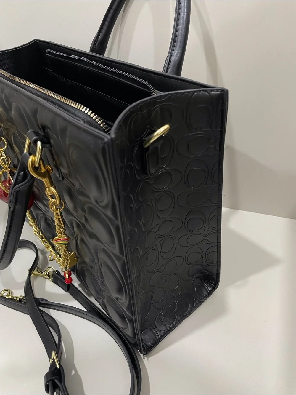 Coach Black Signature Embossed Leather Tote with Cherry Charm